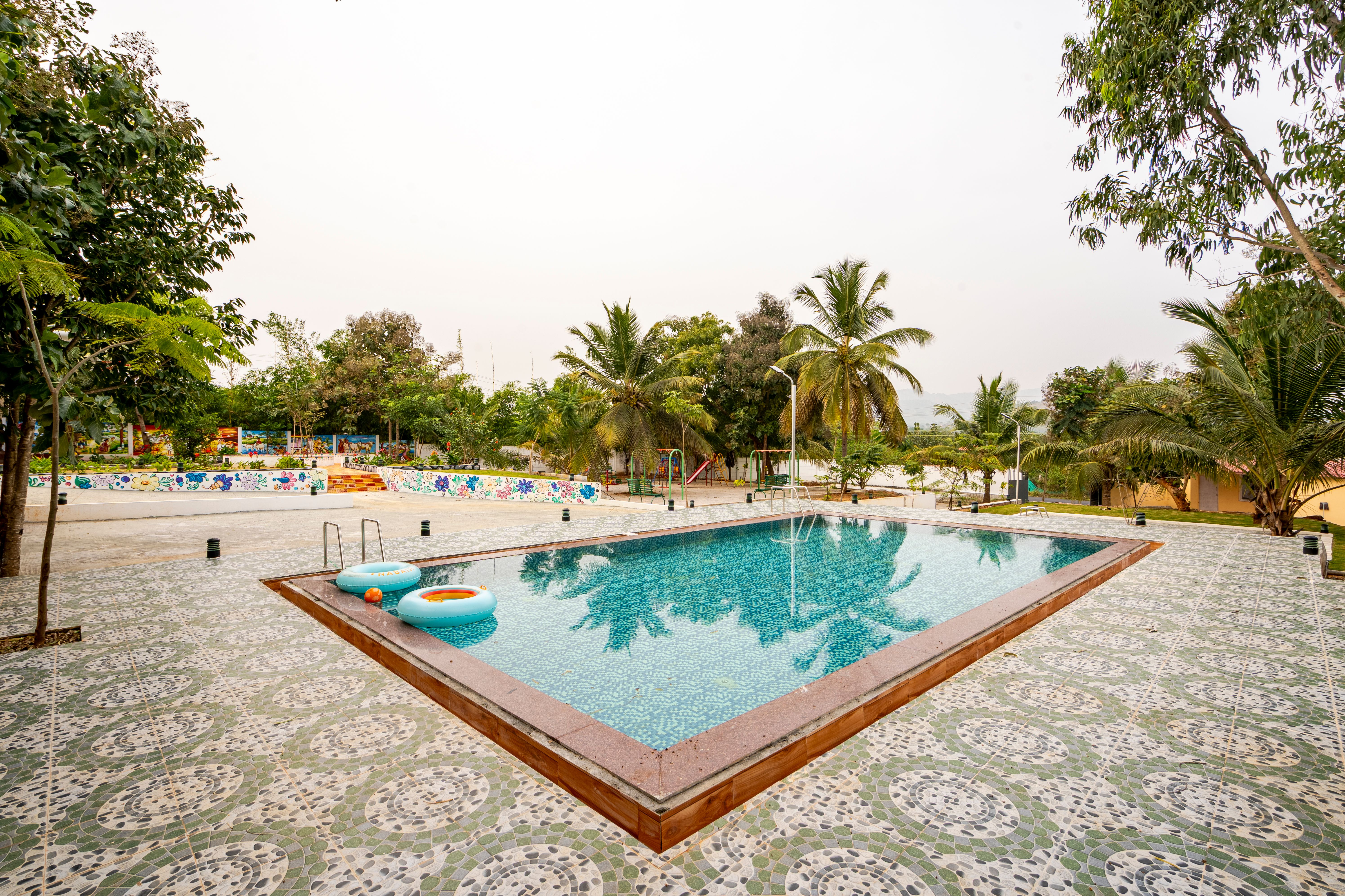 APR | 1 Pet-friendly suite Scenic view with Shared swimming pool, outdoor play area and Fire pit — photo 6