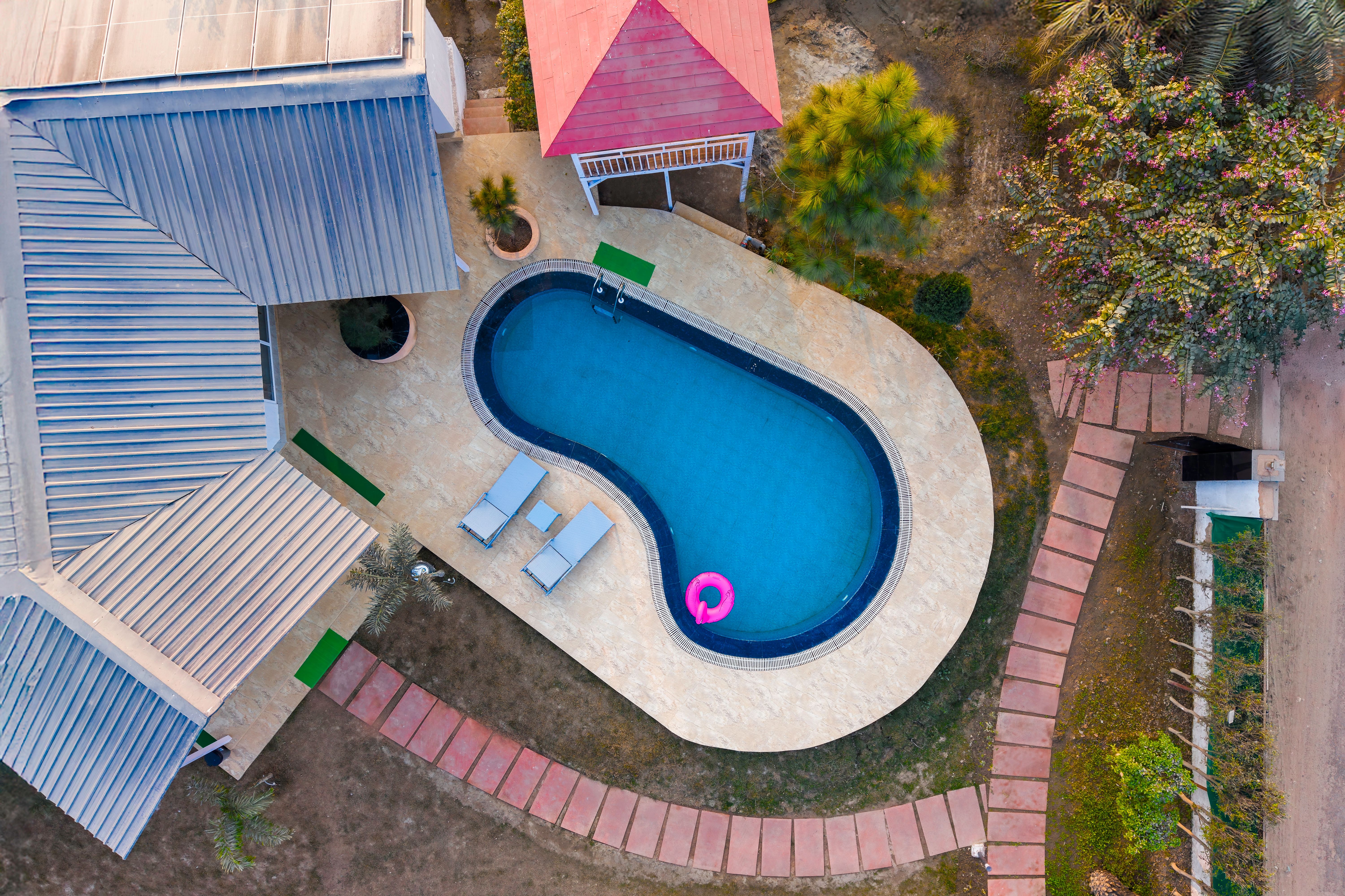 Vedaaz Farms | Pet-friendly 4-BHK Farmhouse With Private Outdoor Pool and Garden area — photo 9