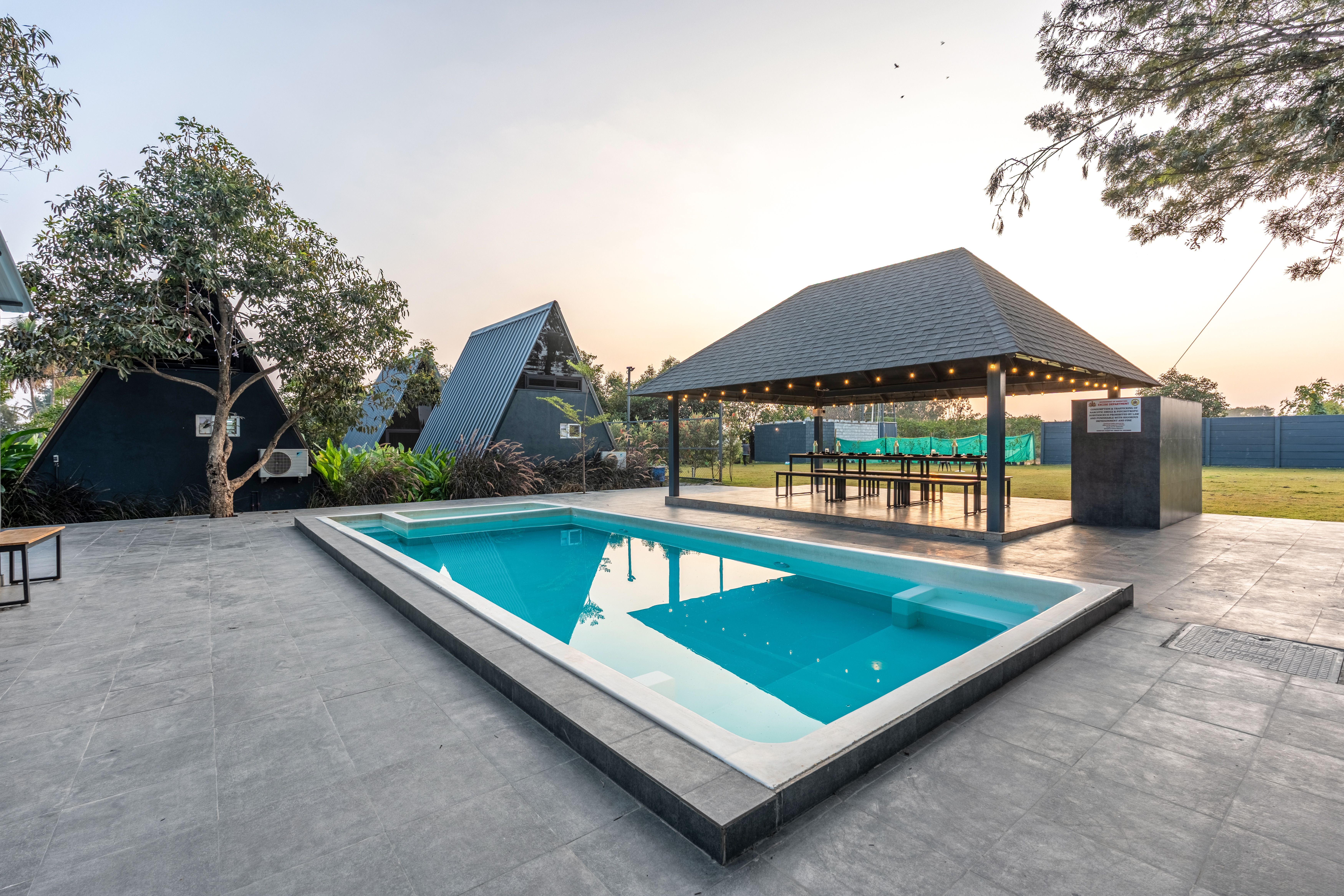 Inara Retreat | Serene Cottage with a Mezzanine Loft, Shared Pool, and Garden — photo 16