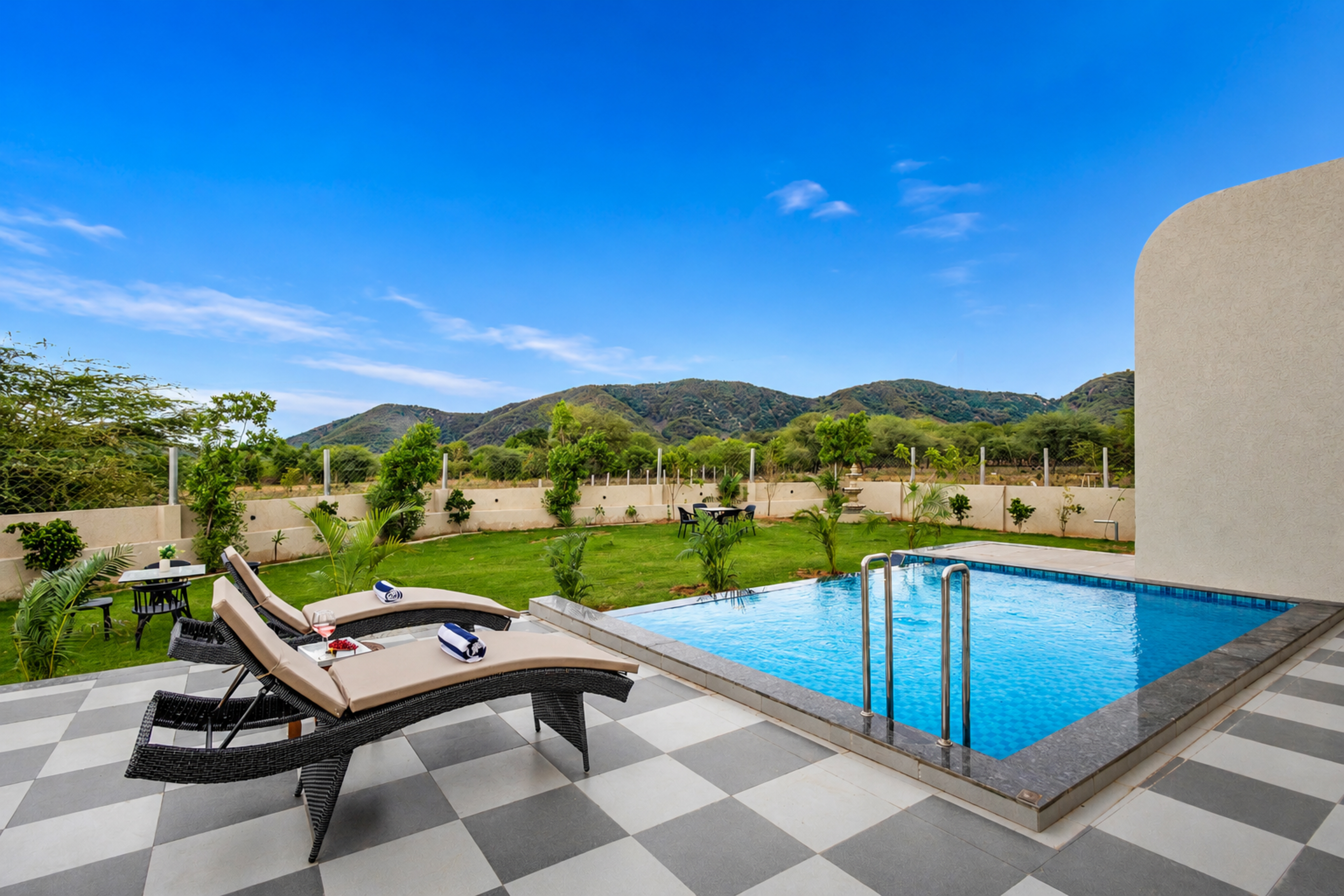 Belvedere Villa | Chic 4-BHK Retreat with Pool, Bar & Landscaped Garden — photo 2