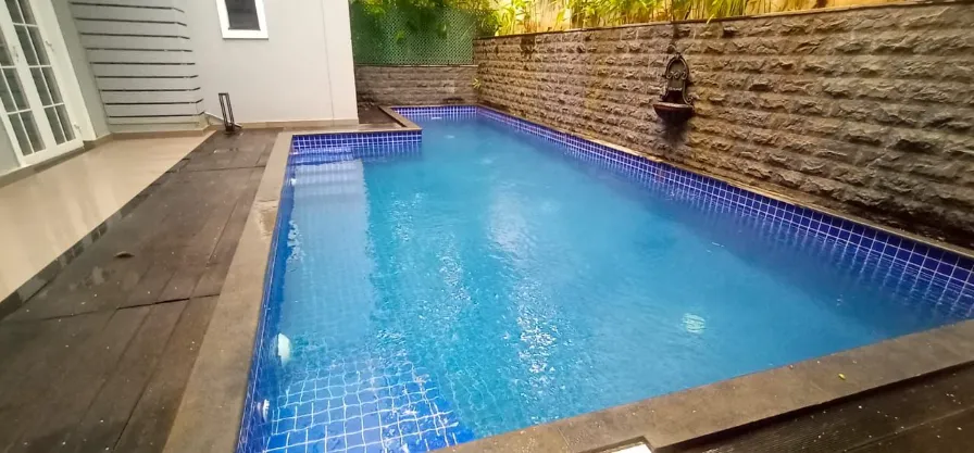 Stylish 2bhk condo in Assagaon with Shared Pool — photo 5